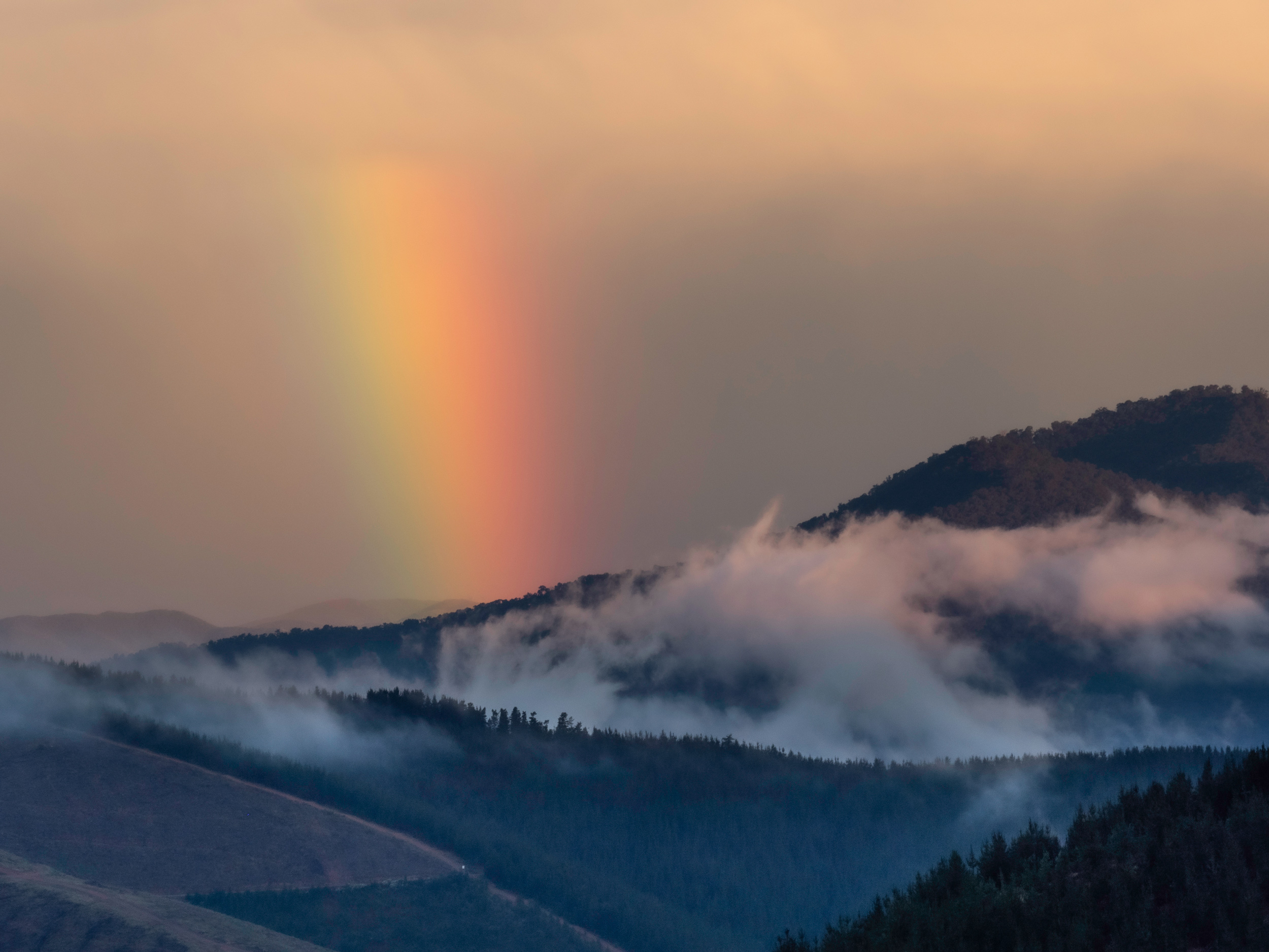 Landschaft mit Regenbogen